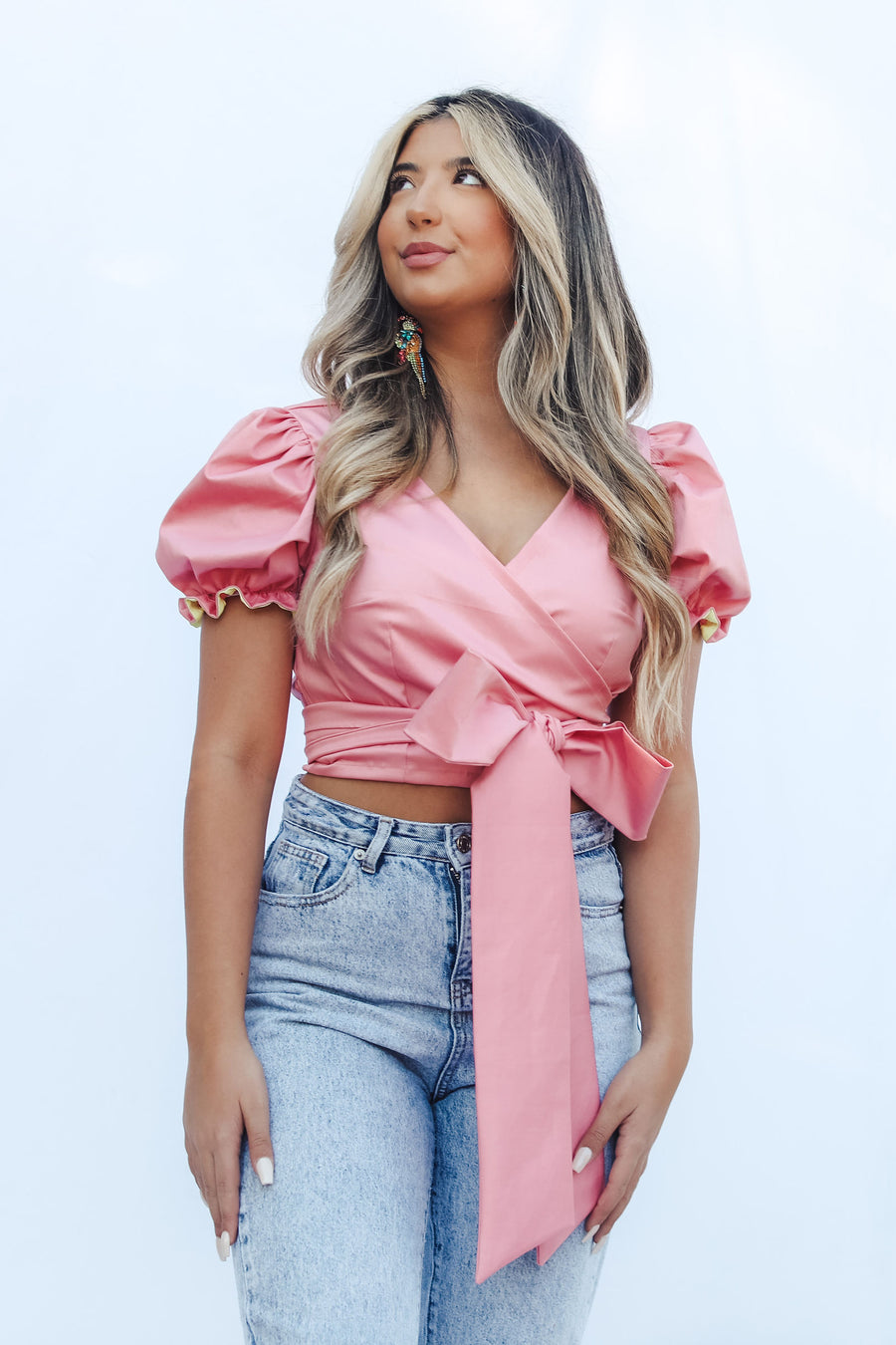 BOW WRAP TOP IN FLAMINGO